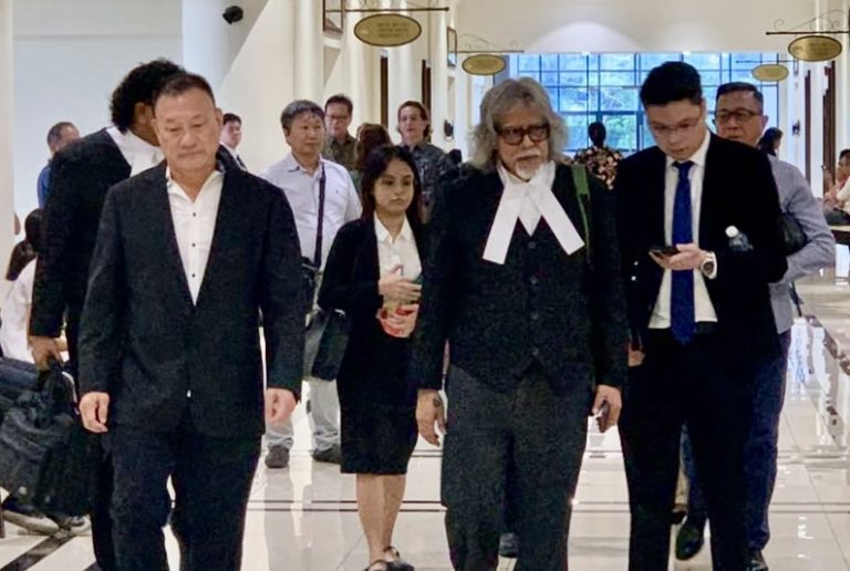 Company director, senior Sabah land officer claim trial to RM18,000 graft charges